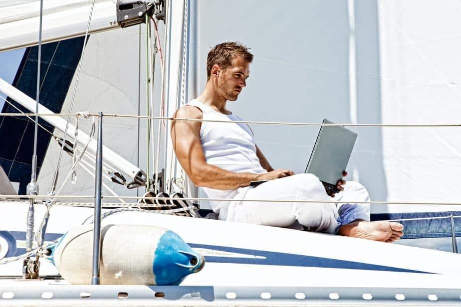 A digital nomad working on a yacht